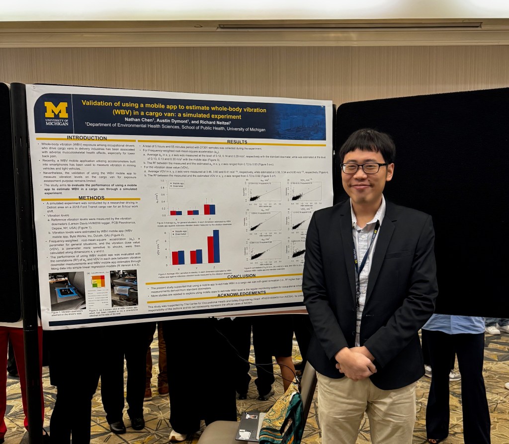Nathan Chen poses with his poster.